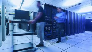 Two men working in a data centre