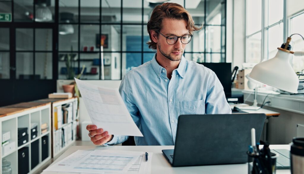 Man looking at a computer